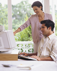 Image - Couple Searching Real Estate on Computer
